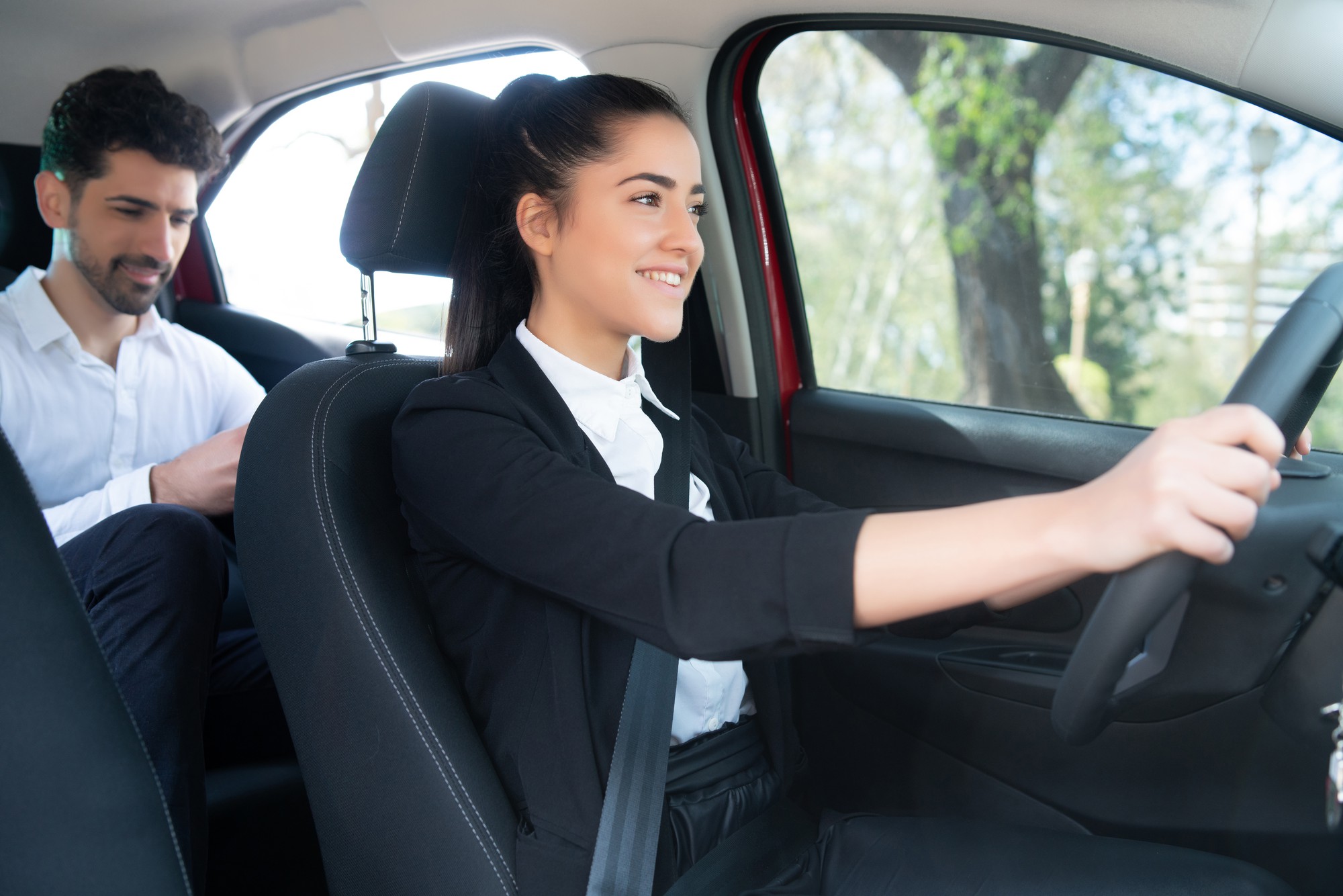 portrait-young-businessman-way-work-cab