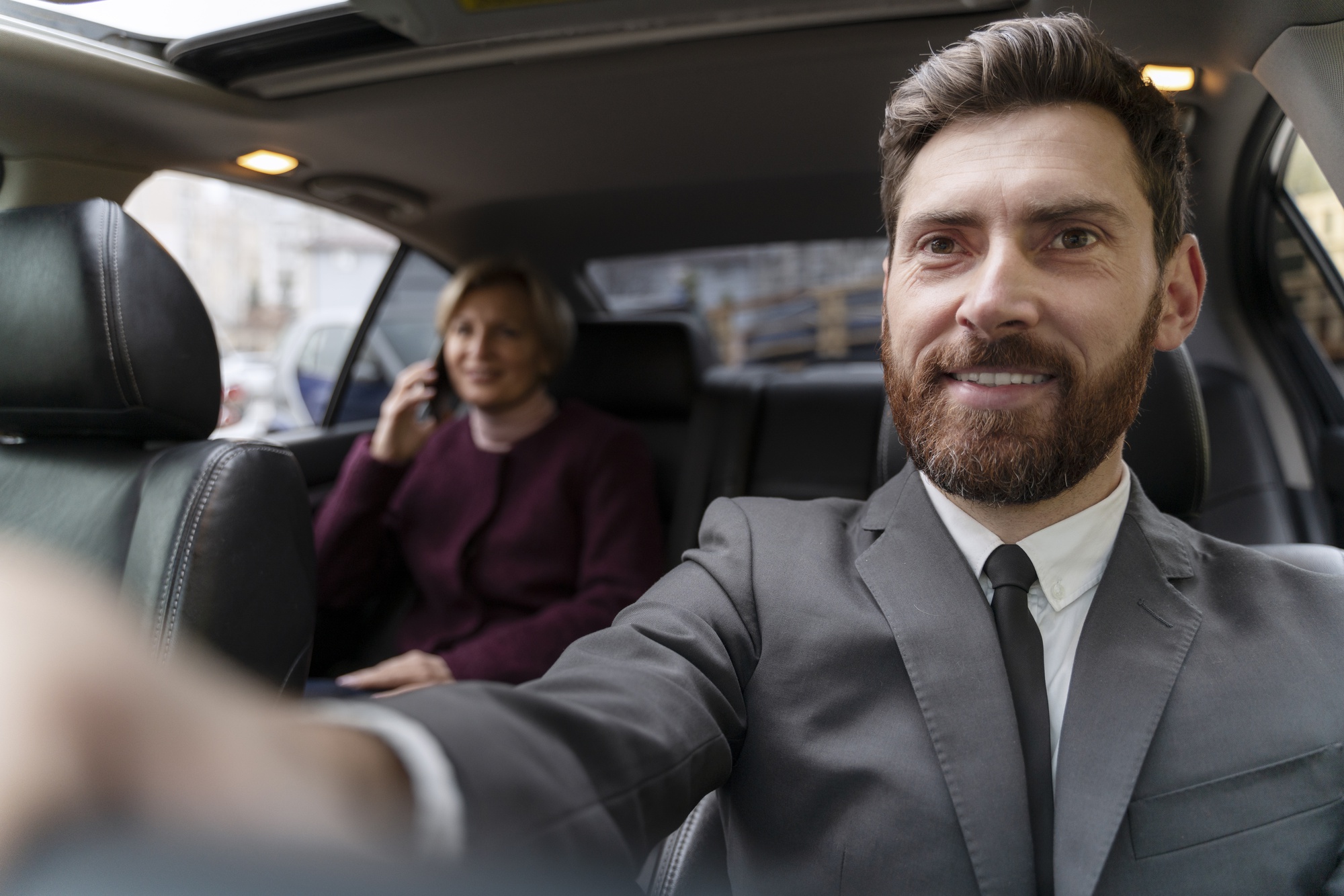 taxi-driver-female-client-interacting-formal-way